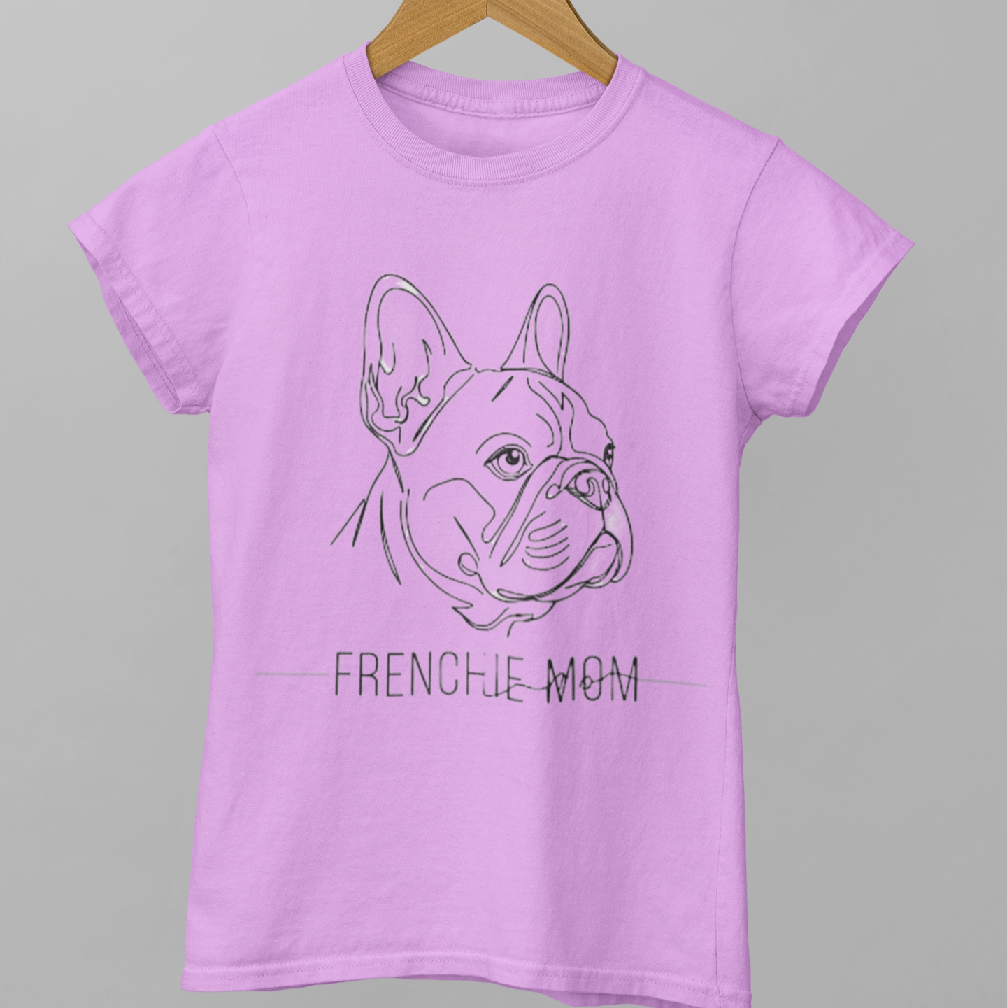 Purple t-shirt with a dog illustration and 'FRENCHIE MOM' text on a gray background