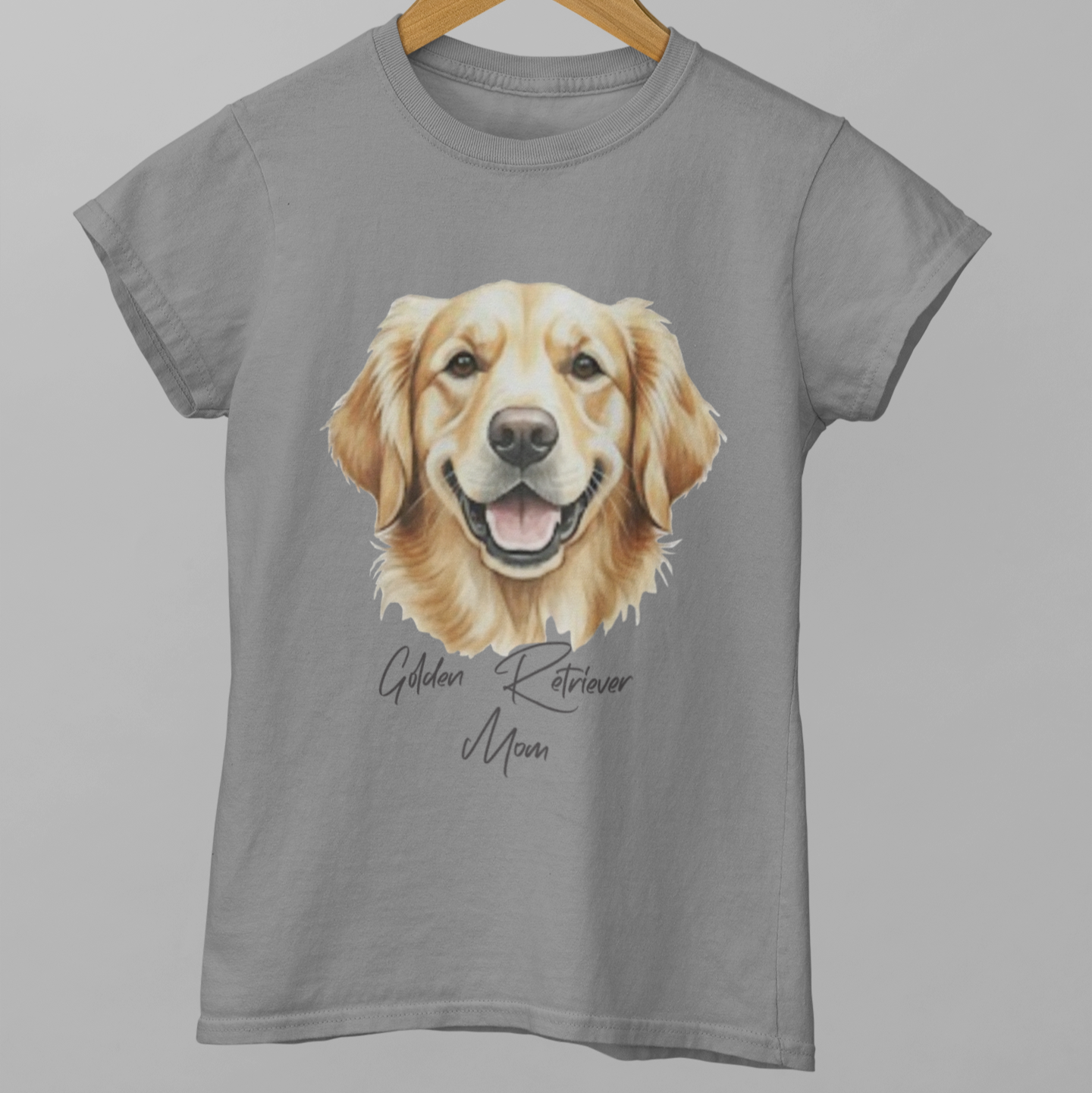 Gray t-shirt with a Golden Retriever graphic on a hanger against a gray background