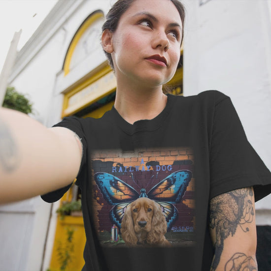 A t-shirt with a graphic design featuring a Cocker Spaniel dog and a butterfly