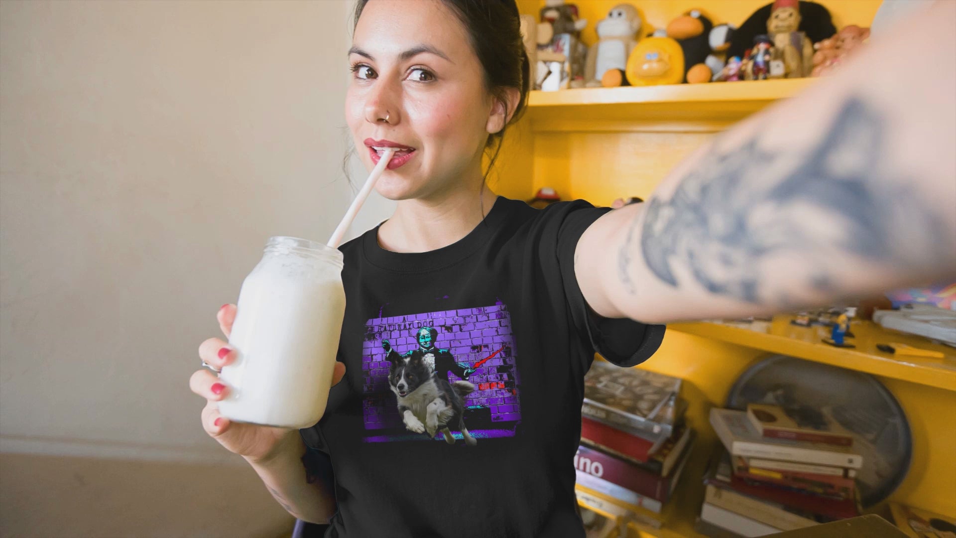 A Border Collie dog, known for its intelligence and herding ability, featured on a t-shirt.