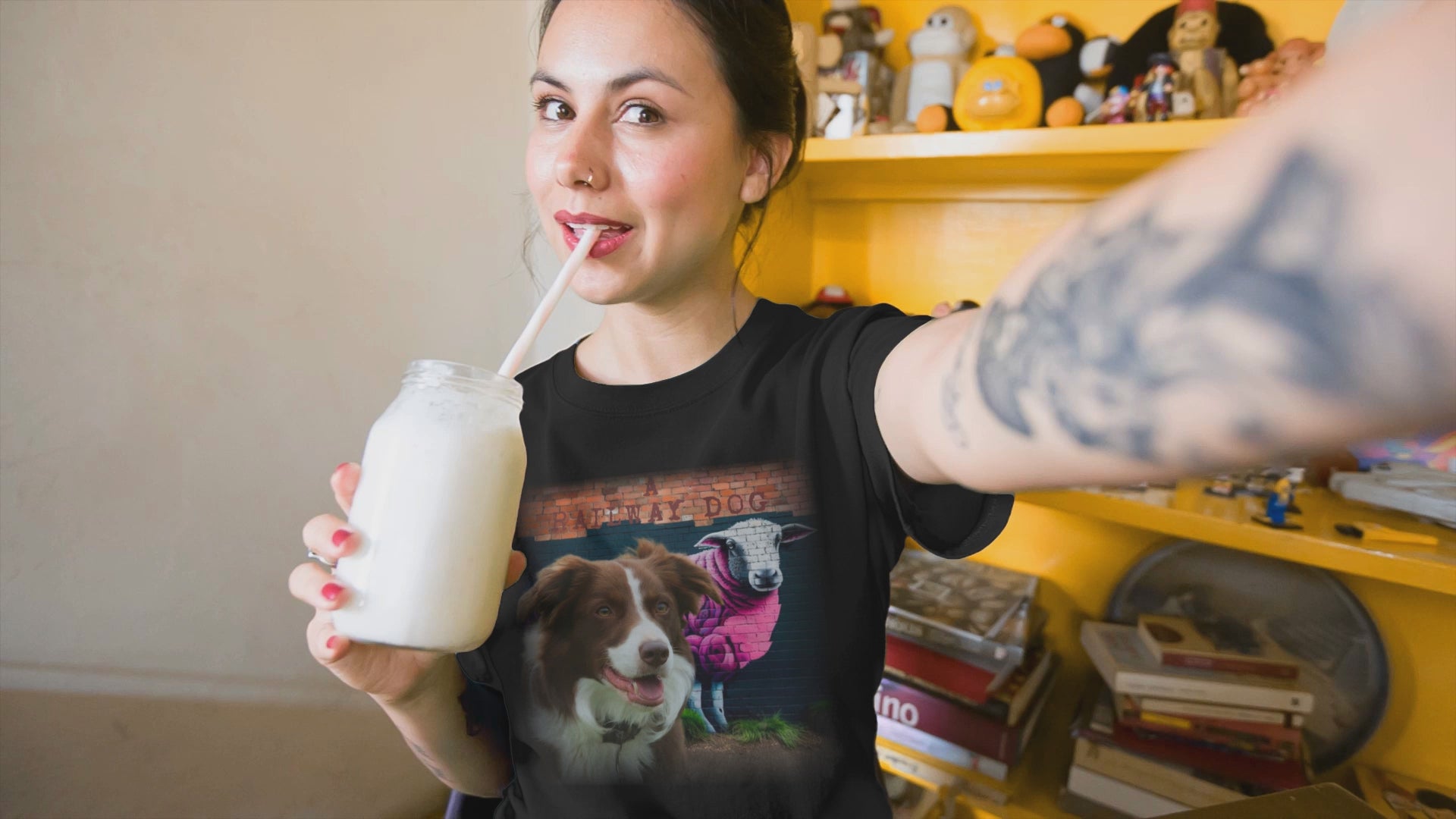 A Border Collie dog, known for its intelligence and herding ability, featured on a t-shirt.