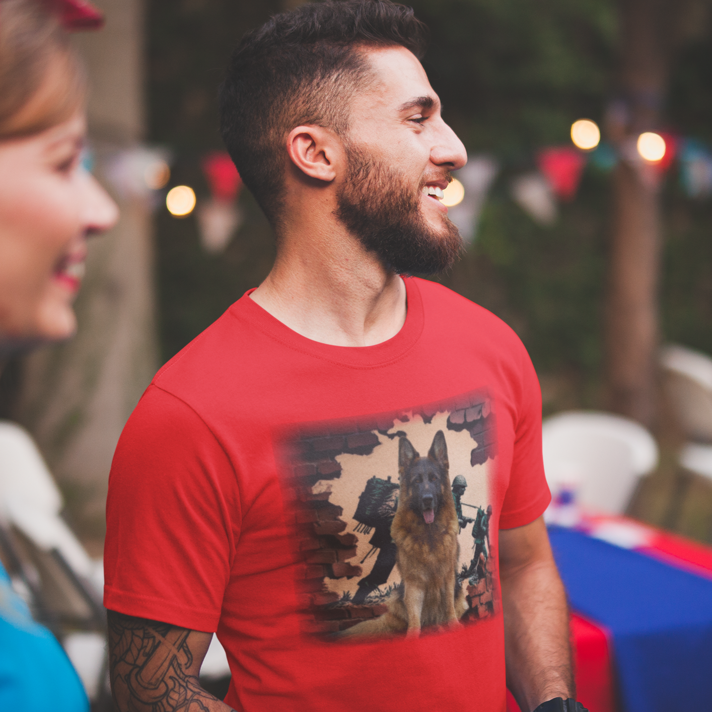 T-shirt with a graphic image of a German Shepherd dog in a military setting.