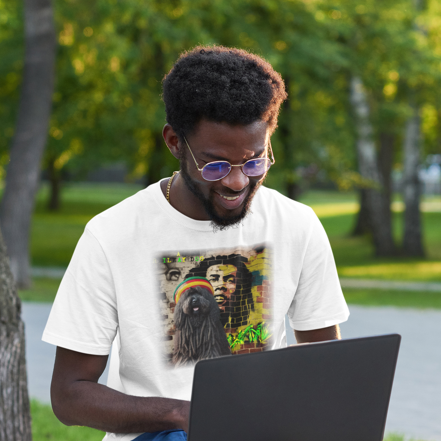 T-shirt featuring a Puli dog and Bob Marley, a reggae legend.